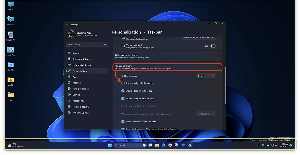 How can you hide the Taskbar on Windows 11